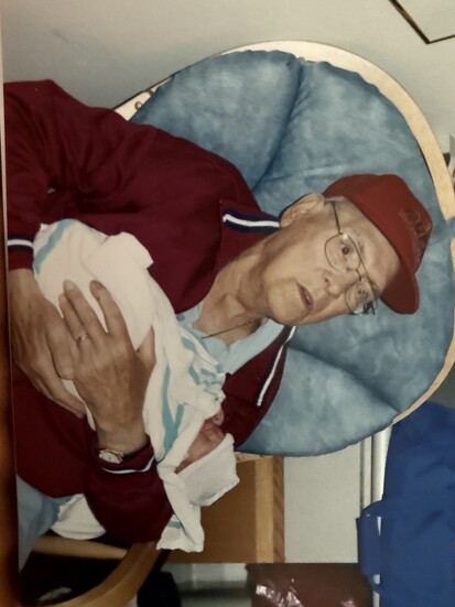 Grandpop with his third grandchild, my son, Milo