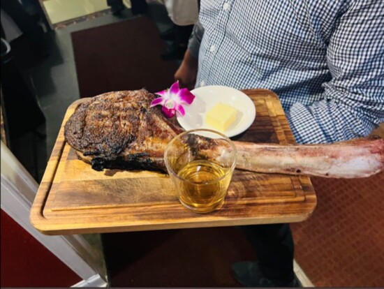 A "tomahawk" steak served at Red Fox Prime Steakhouse.