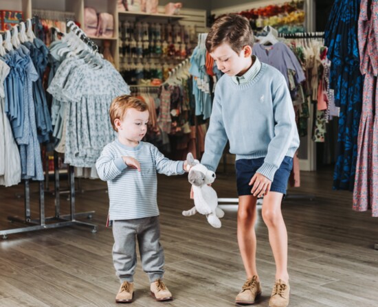 Boys wearing The Beaufort Bonnet Company and classic Bucky Footmates shoes.