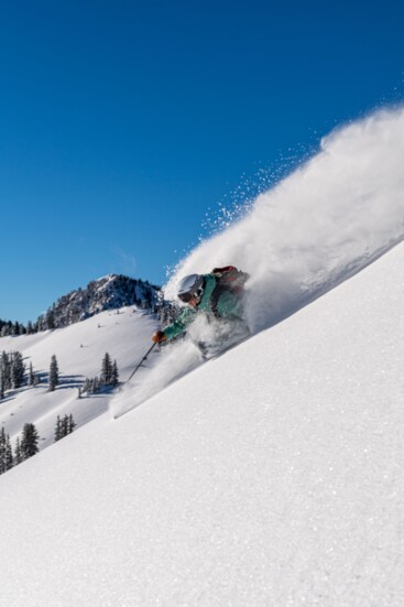 Stio Ambassador Nicole Cordingley glides through deep, record-setting powder at Alta Ski Area. Photo credit: Lee Cohen 