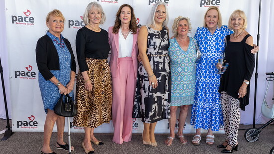 Board Member, Patricia Patterson (pink outfit, middle) and friends attend the Empowerment Luncheon