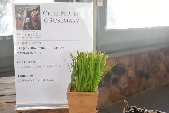 A sign detailing two of the desserts at the Spice & Wine Pairing event at the Vandiver Inn. 