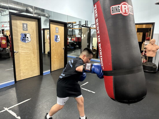 Hitting the heavy bag at PAL