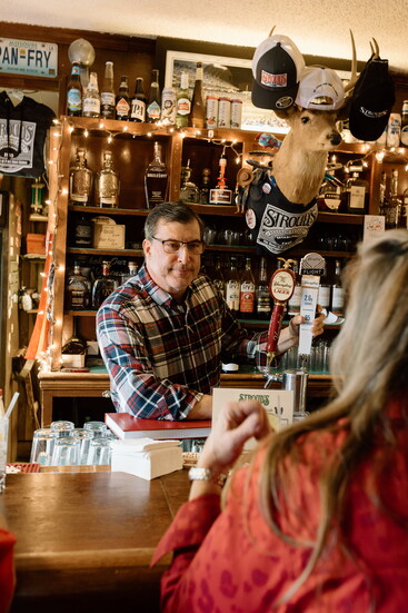 Bartender Mike Vogt tends to customers