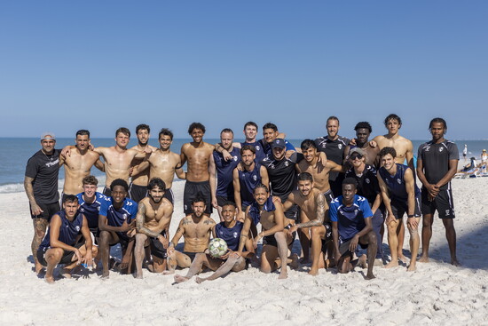 The team getting some fun beach training in...