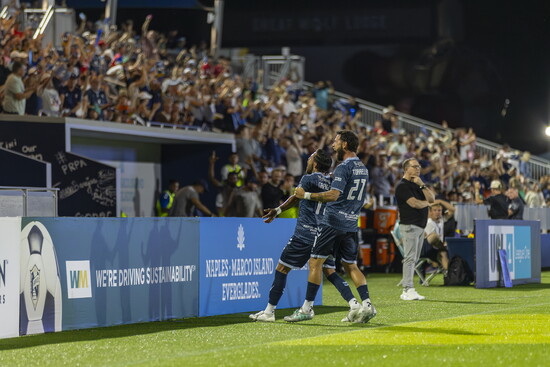 FC Naples celebrating a game-winning goal in front of an enthusiastic home crowd!