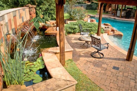 Water features can serve as privacy walls as well as cooling down the space on hot summer days.