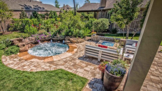 This fire pit and whirlpool effortlessly share an expand a small space.