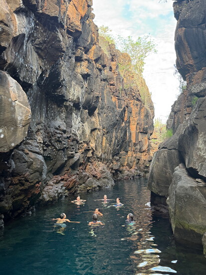 Swimming in Las Grietas (the Grotto), a natural inland pool resulting from an earth fracture between high volcanic walls