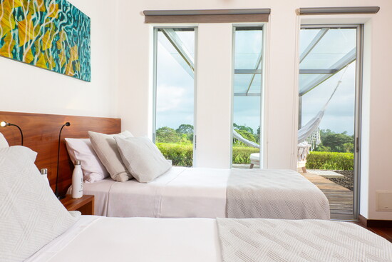 A airy room with stunning views at the Montemar Eco Luxury Villa