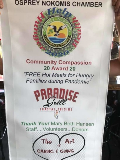 Paradise Grill received an award from the Osprey Nokomis Chamber for its charitable giving