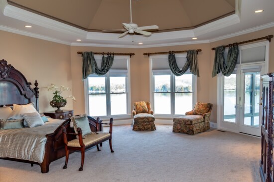 The master bedroom has multiple views of Old Hickory Lake.