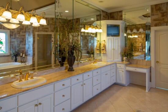 The fully-equipped master bathroom is spacious and airy.