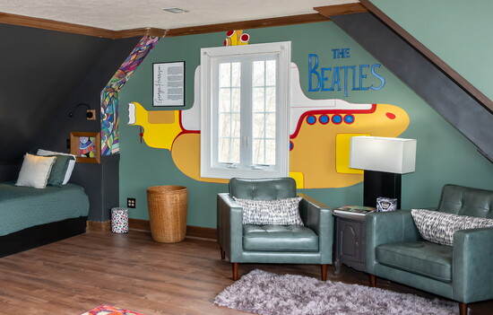 A large upstairs loft is decorated with Beatles memorabilia and it is equipped with sleeping berths and den furniture. 
