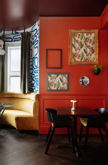 The popular banquette nook got a makeover complete with hand-painted walls