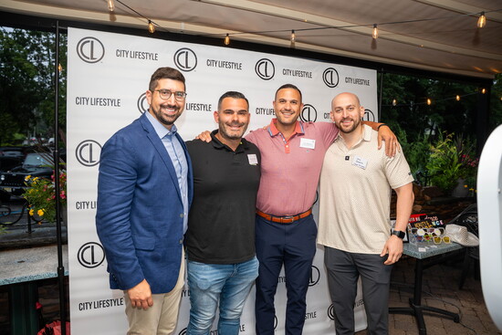 Publisher Anthony Rizzo with guests having fun at the event.