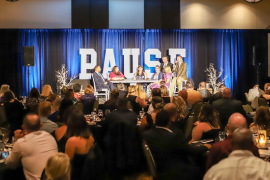 Pause Gala Table Talk with families.