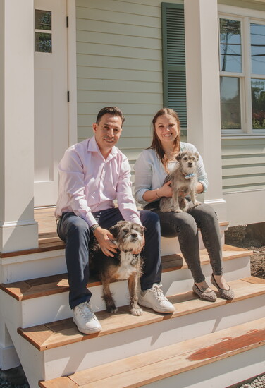Dr. Masha Kremerman-Waltz with her dogs, Flower and Bart, and lead technician Stuart 
