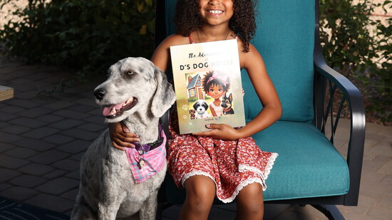 Dakota with her dog, Hampton.