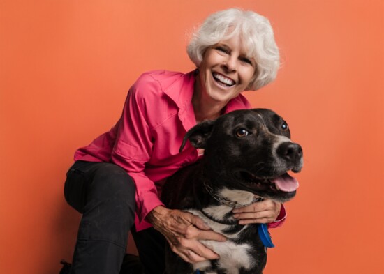 Volunteer Elaine Smith with 3 year old Rocco. He has been at the shelter since 2022.