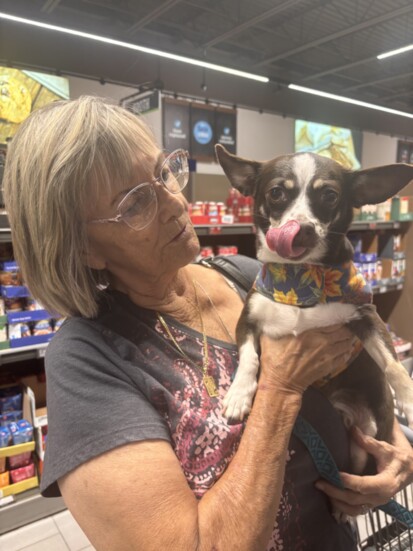 Marie King and her dog Crackerjack go shopping in Aldis