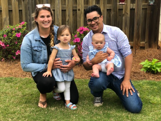 Coaches Becca and Brandon Tucker with their children. 