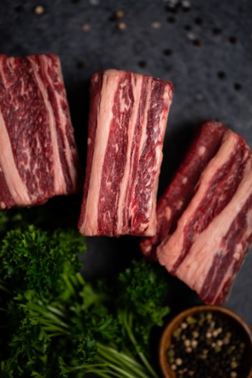 Beef short ribs are best cooked in a dutch oven, slow cooker or cooked on low in a smoker grill. Look for thick bone-in, meaty ribs with good marbling.