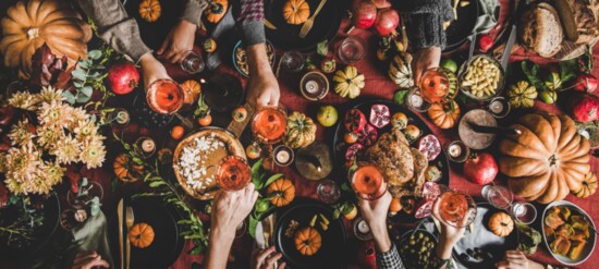 A Thanksgiving spread with wine.