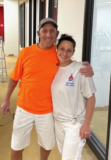 Paulie Tirella and Kristen Bevin on a job site. 