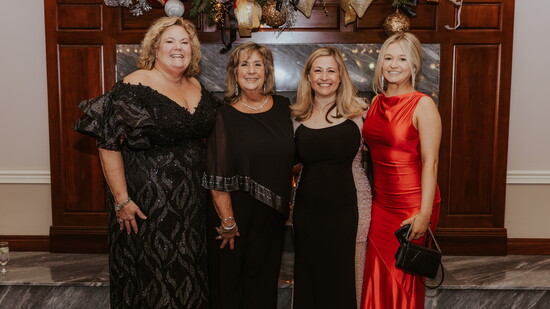 L to R: Jean Raga, Cathy Richards Harbison, Sherry Taylor and Alyssa Phelps at the 2024 Christmas Tree Auction and Holiday Ball.