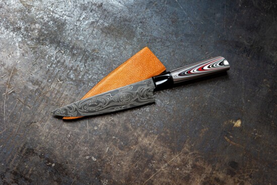 Fordite handled petty knife- the handle is made from hundreds of layers of paint from an old Ford factory- with a stainless Damascus steel blade