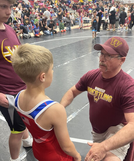 Coach Ramsay and staff provide coaching while the teammates rally behind to support each other. 