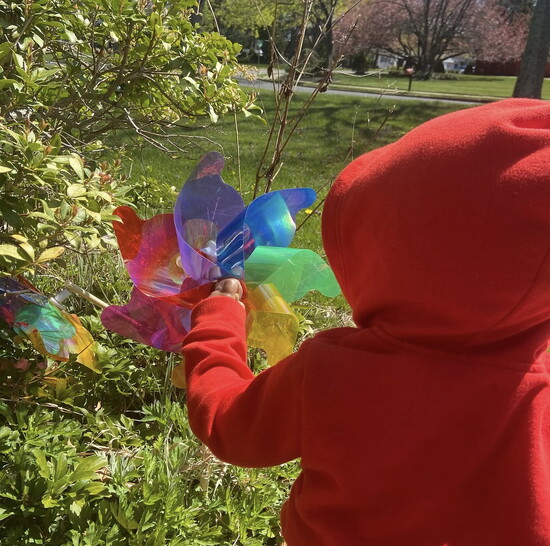 A child and a pinwheel