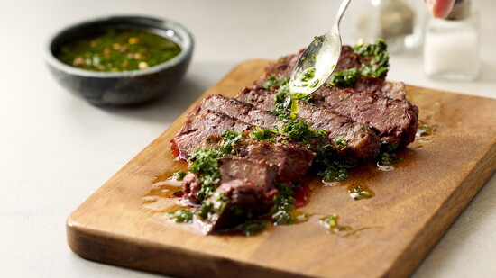 Beyond Meat steak filet with chimichurri sauce.