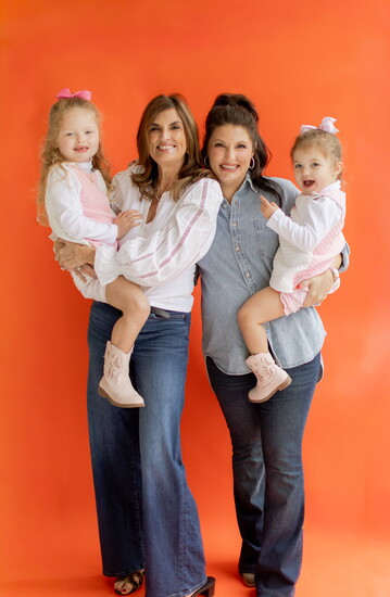 Kelly Sweeting (right) with her daughters and Connie Jones, her mom and business partner.