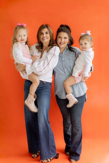 Kelly Sweeting (right) with her daughters and Connie Jones, her mom and business partner.