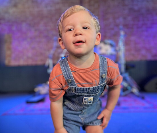 Greg’s son Bodhi celebrates on stage after Greg in Good Company takes home a win at the Battle of the Bands.