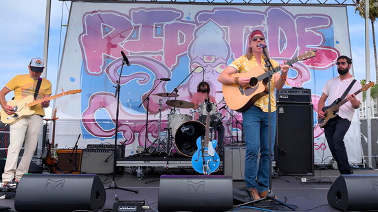 Greg in Good Company warms up on BeachLife’s Riptide Stage before their performance is cancelled.