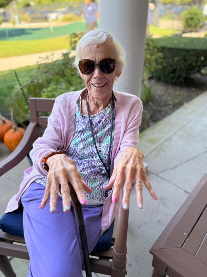 Norma shows off her latest nail art creation.