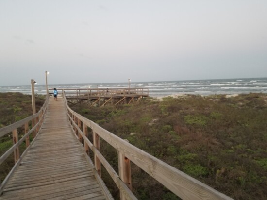 After your meal, take a walk down the boardwalk to the beach along the beautiful Gulf of Mexico.