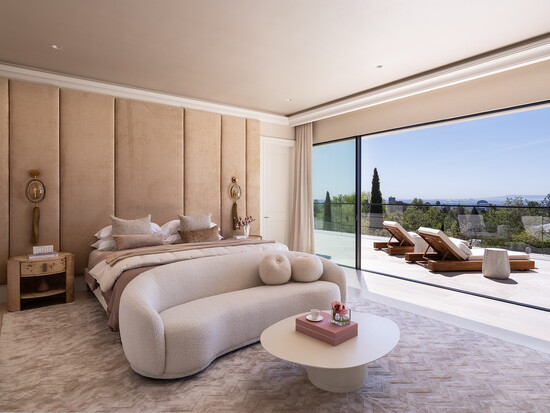 The primary bedroom has sweeping city to ocean views