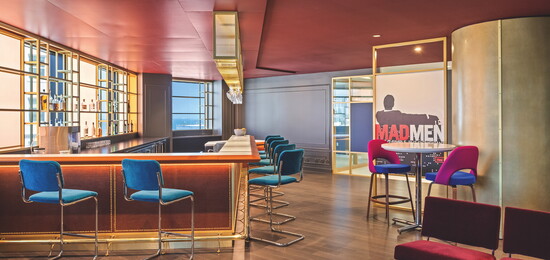A stylish in-office bar combines mid-century modern aesthetics with ocean views, creating a relaxed setting for meetings, team celebrations, mixers and more.
