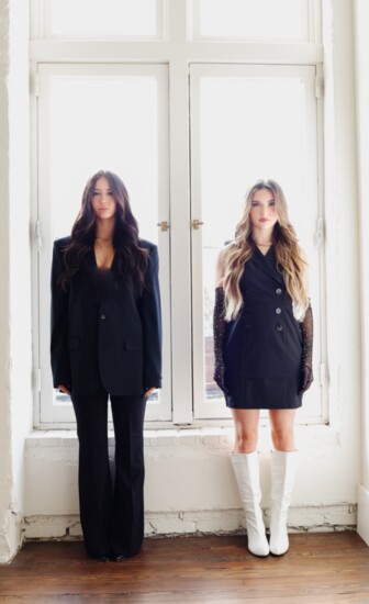Seeing double. Brittany and Maddy pose beautifully to display the high standard of services one receives at the salon and spa. 