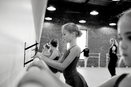 A young ballerina in thought