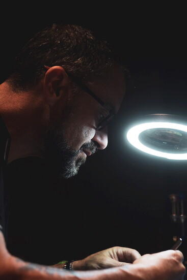 Nathan Apodaca works on a timepiece. 