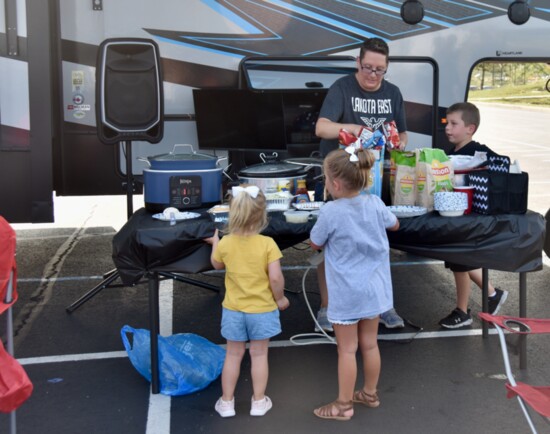 Sweet + savory snacks to share and Putter's catering fill the tailgate buffet at the Chaney's RV. 