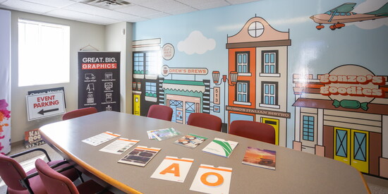 SpeedPro’s conference room covered in SpeedPro printed material 