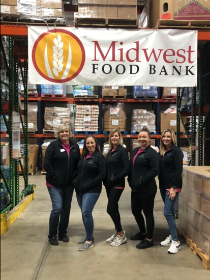 Team members volunteered at Midwest Food Bank.