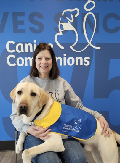 Diane Gudaitis and Casper on the day he moved to the North Central Training Campus for continued training.