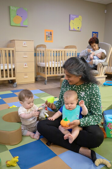 Seena Parikh with children at the Primrose School of Forest Hill. Photo Credit: Kerry Paradis Photography